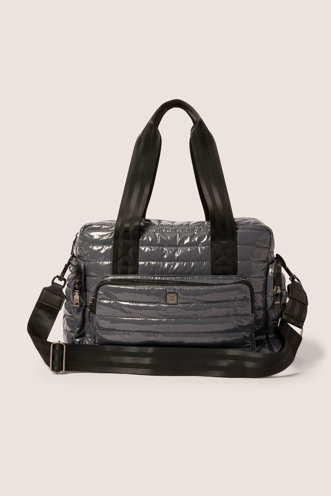 black quilted travel tote bag Voyager Travel Tote