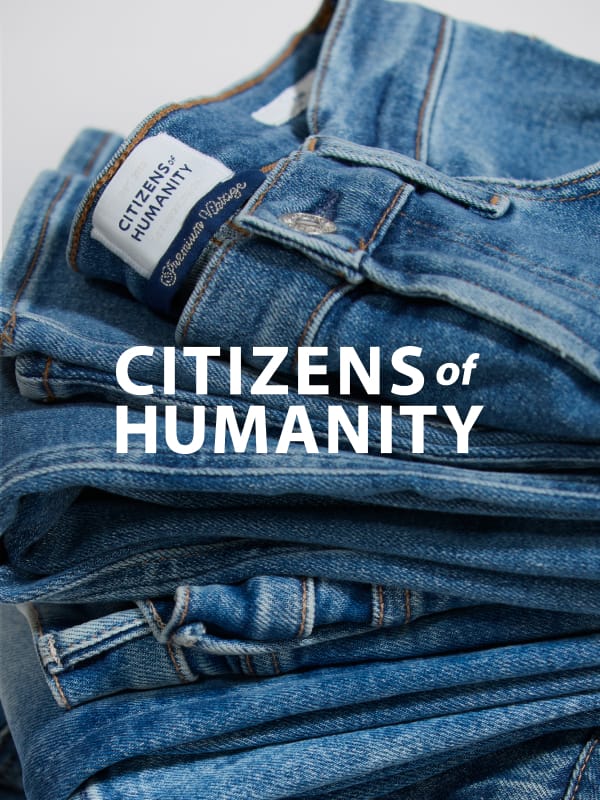 A pile of folded Citizens of Humanity brand jeans