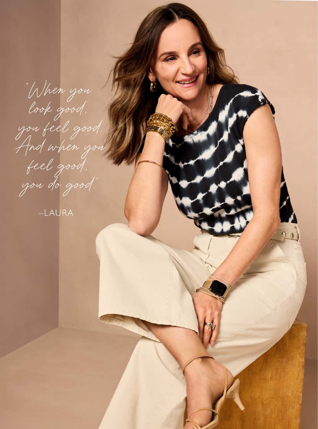 Image of Laura wearing tie dye tee with ivory pants