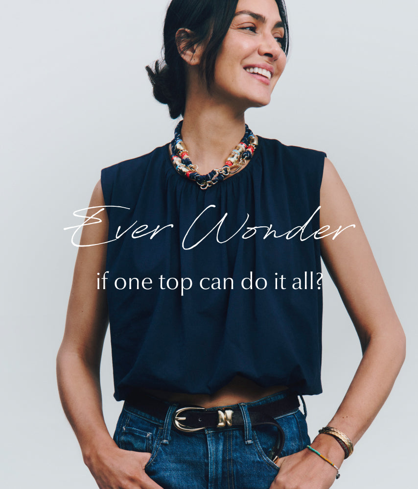 Woman wearing a navy sleeveless top with text overlay on a plain background