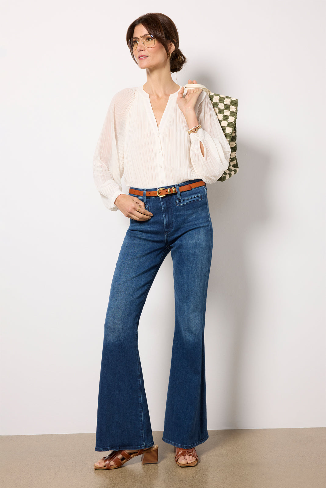pleated sleeveless blouse