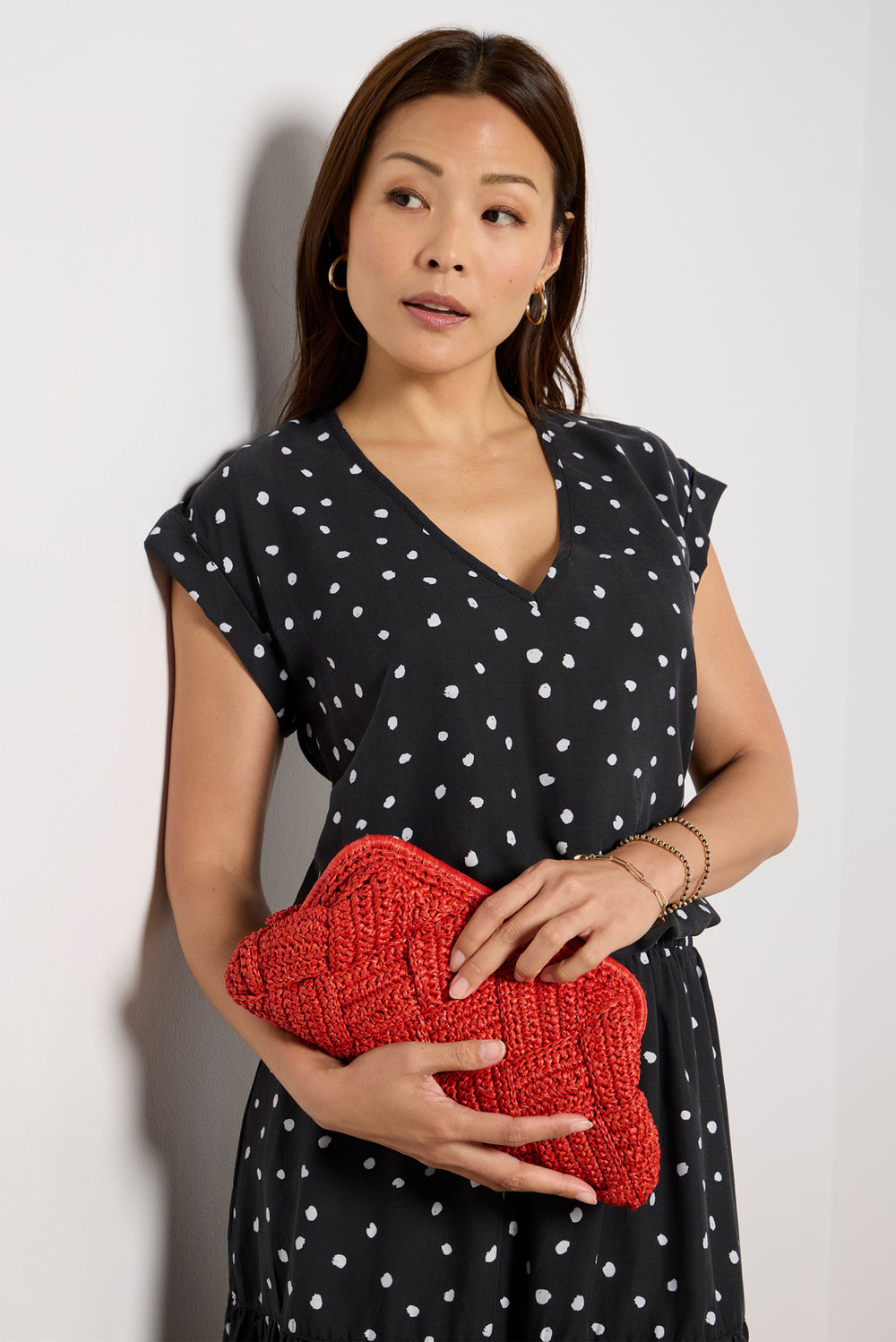 Elegant V-neck top with artistic appliqué and denim detailing main image 0