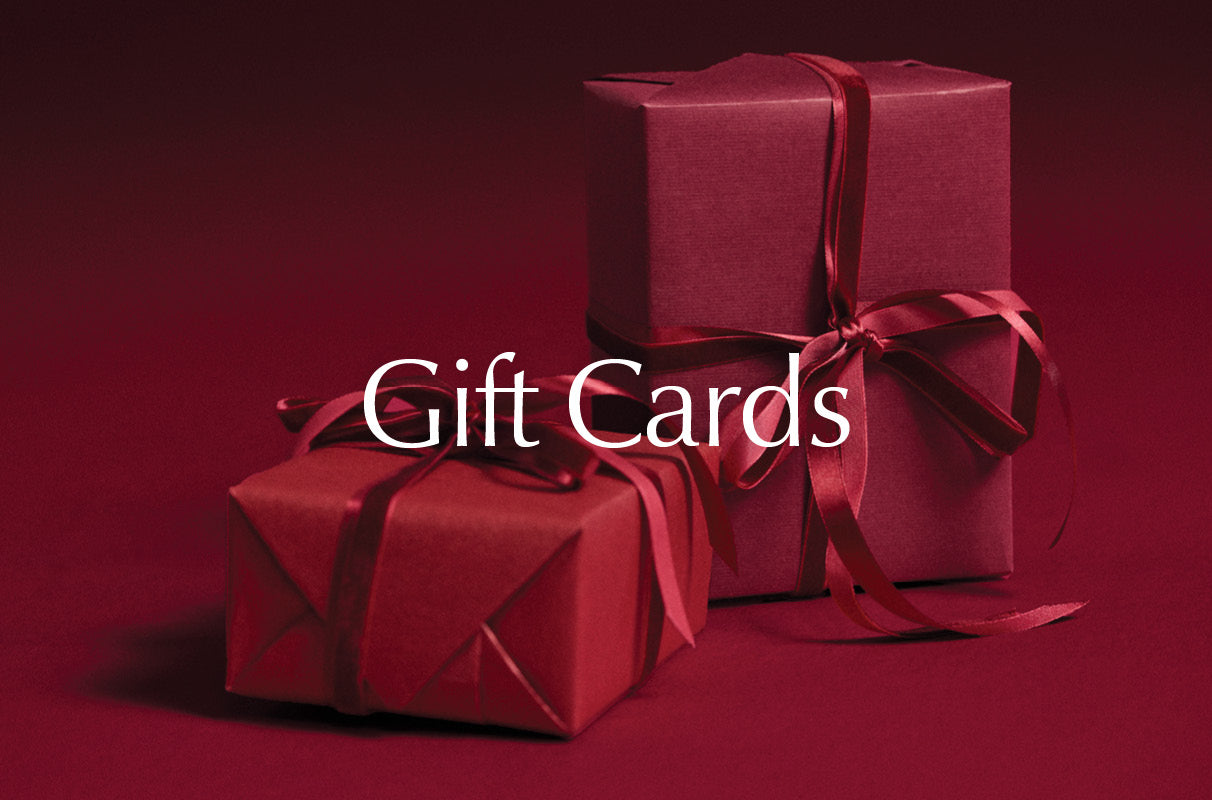 Image of red wrapped gift boxes with red ribbon