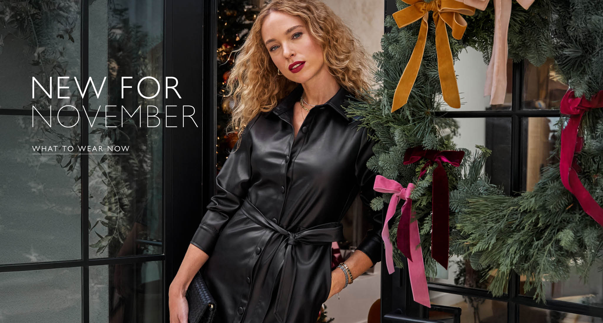 Woman wearing a black faux leather button down shirt dress with silver boots. Text over the image reads “New For November, What to Wear Now