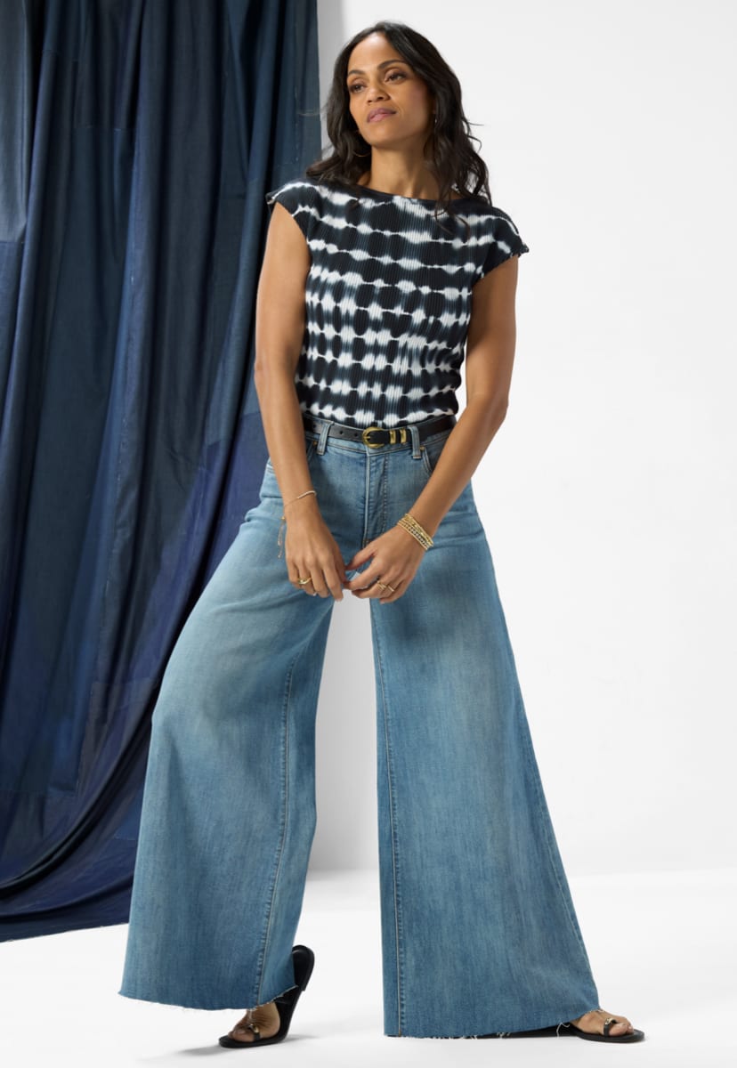 Image of woman wearing wide leg jeans