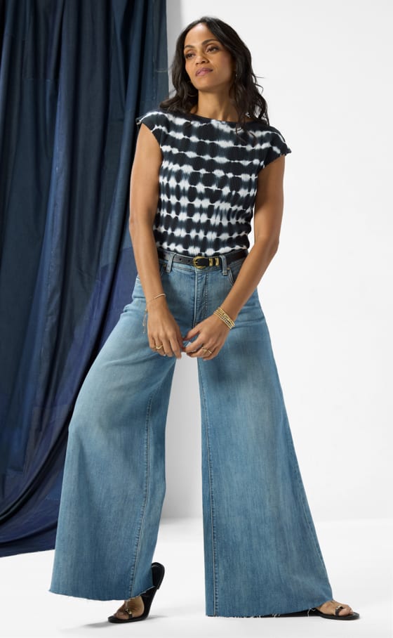 Image of woman wearing wide leg jeans