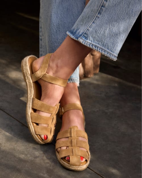 Image of woman wearing fisherman sandals.