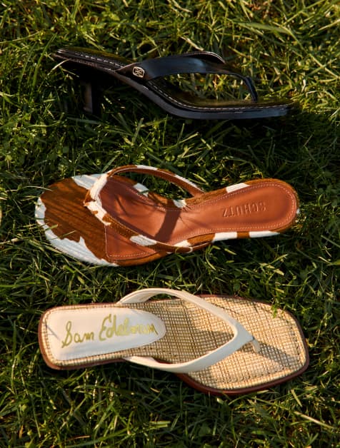 Image of two different sandals, one printed and one solid ivory