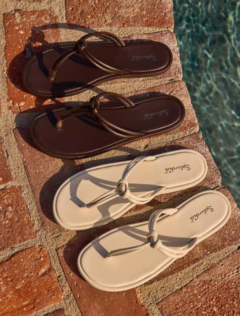 Image of ivory slip-on sandals and brown slip-on sandals