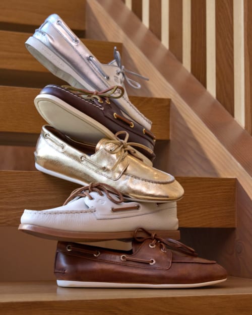 Image of a stack of Sperry brand boat shoes.