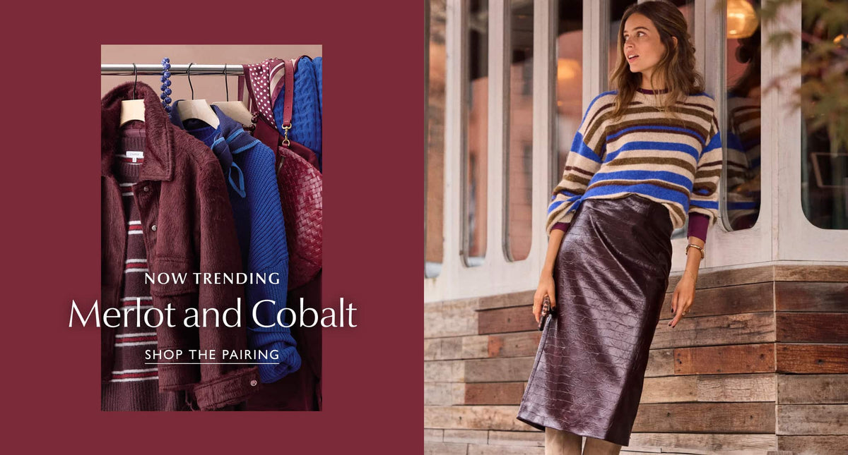 Cobalt blue and Merlot colored womens fashion items by EVEREVE hanging on a clothing rack.